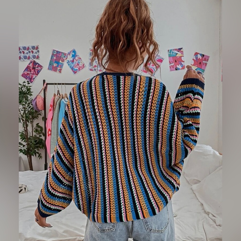 This sweater is a small but could fit a medium it runs a little big.